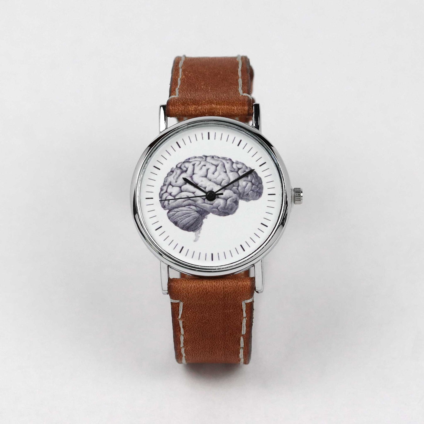 Brown leather wrist watch with a brain on the dial