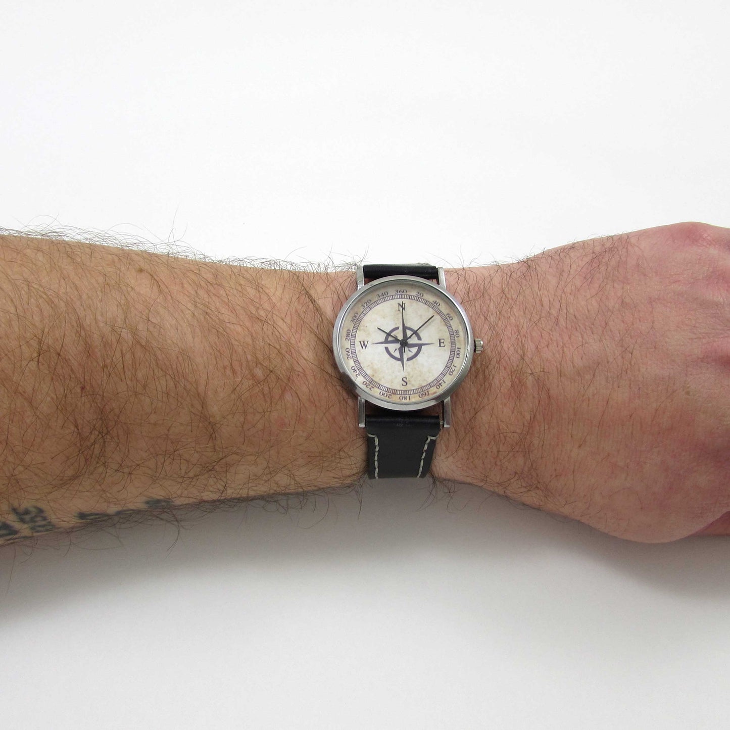 Compass Black Leather Watch displayed on a wrist