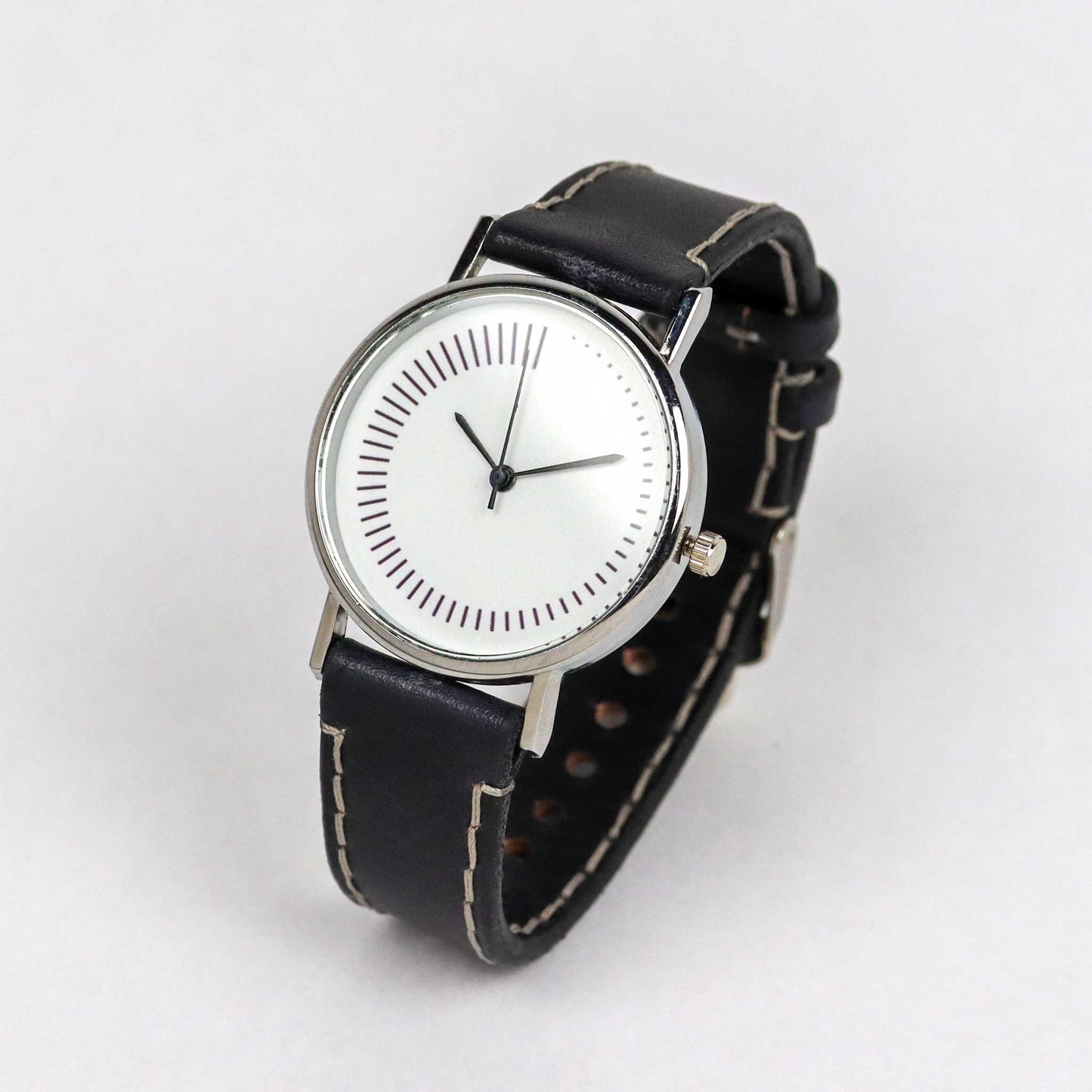 Radial dial watch with black band