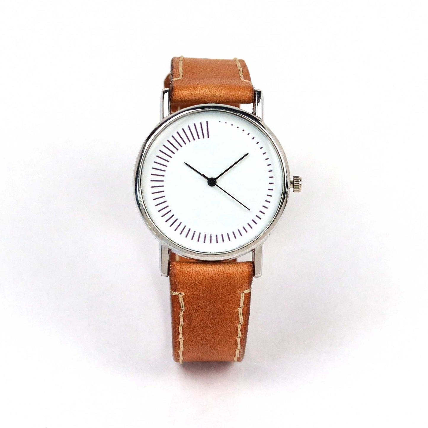 minimal watch design without numbers and brown strap