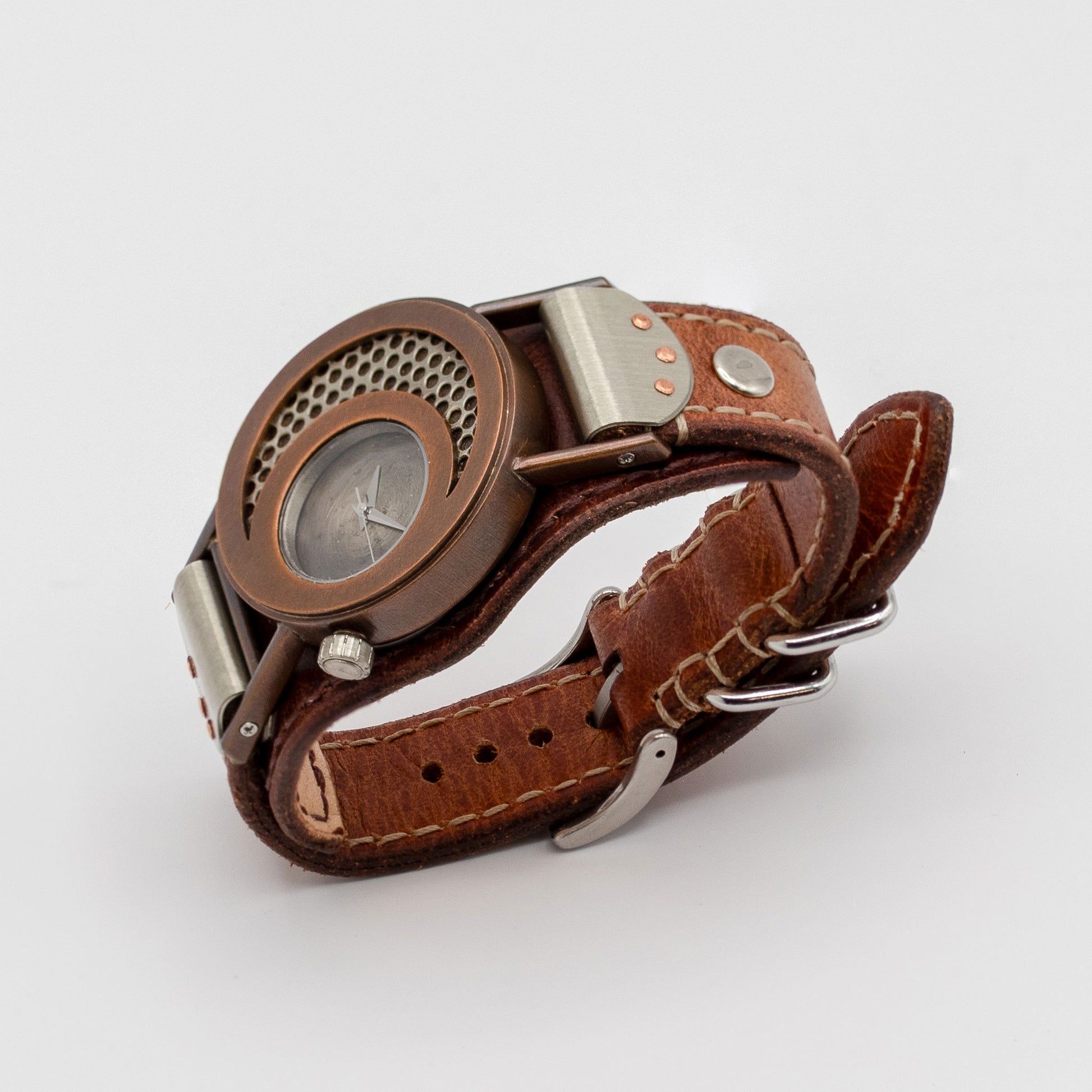Brown leather wristwatch with metal accents on a white background