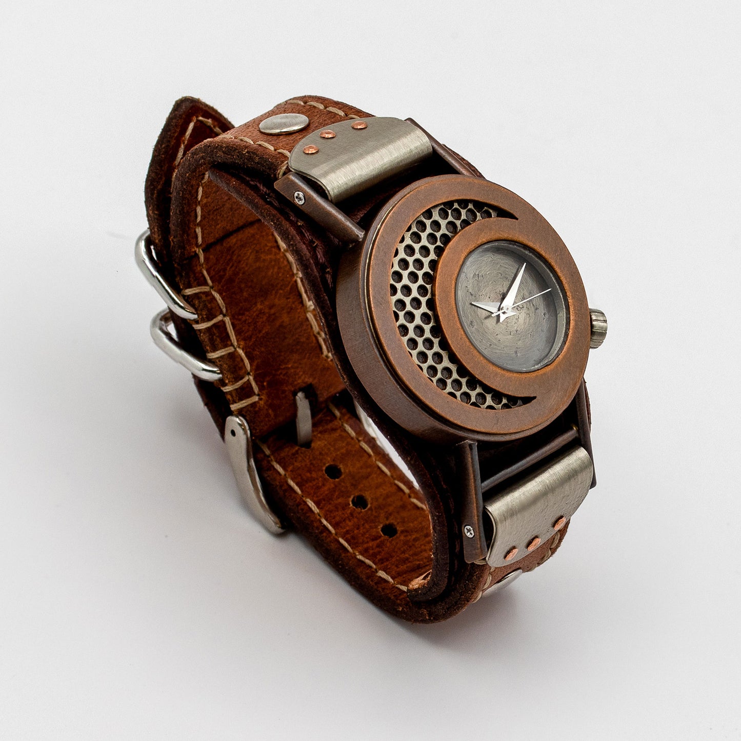 Steampunk-style wristwatch with brown leather strap and metallic copper casing on a white background