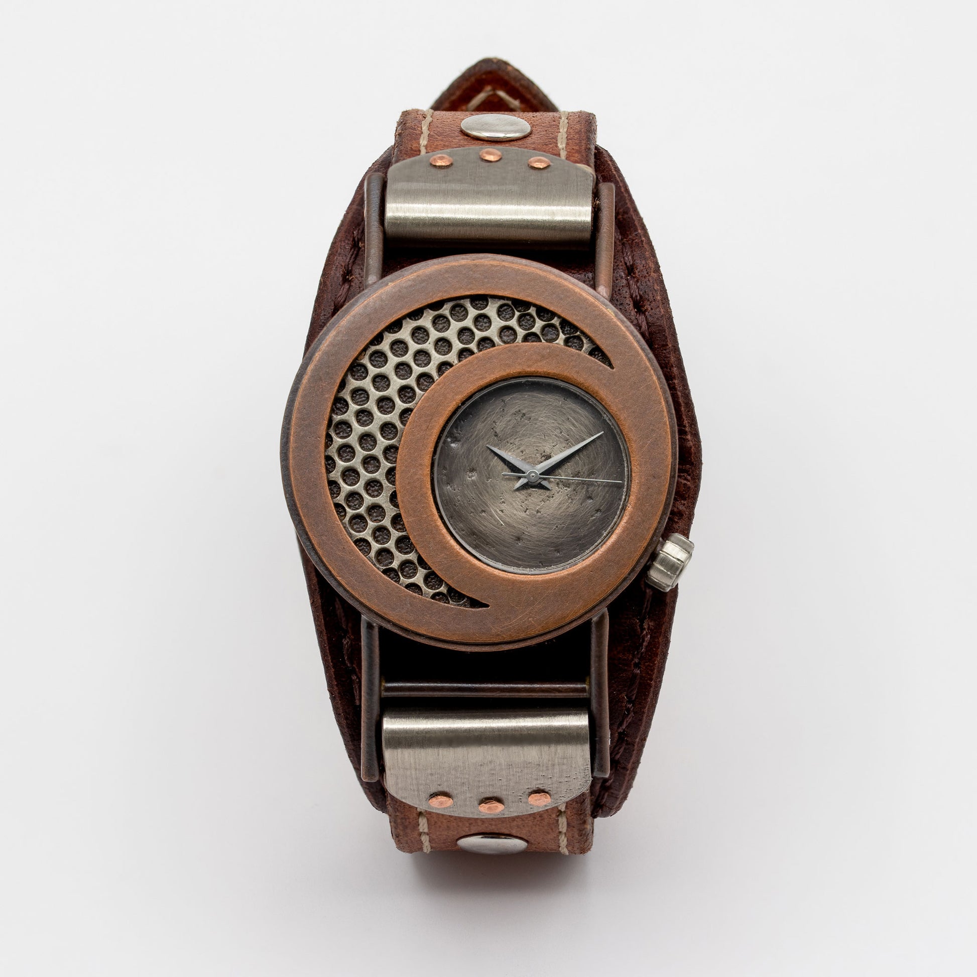 Copper wristwatch with metal accents on a white background