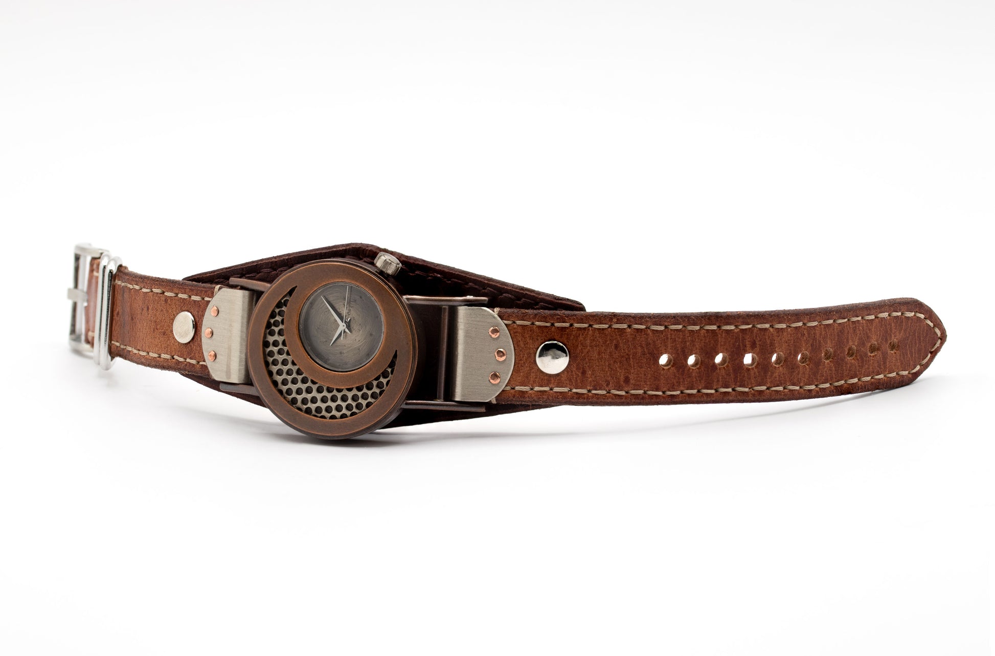 Brown leather wrist watch with metal clasp on a white background