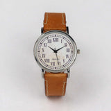thirteen hour wrist watch with a brown strap