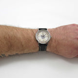 Compass Black Leather Watch  displayed on a wrist