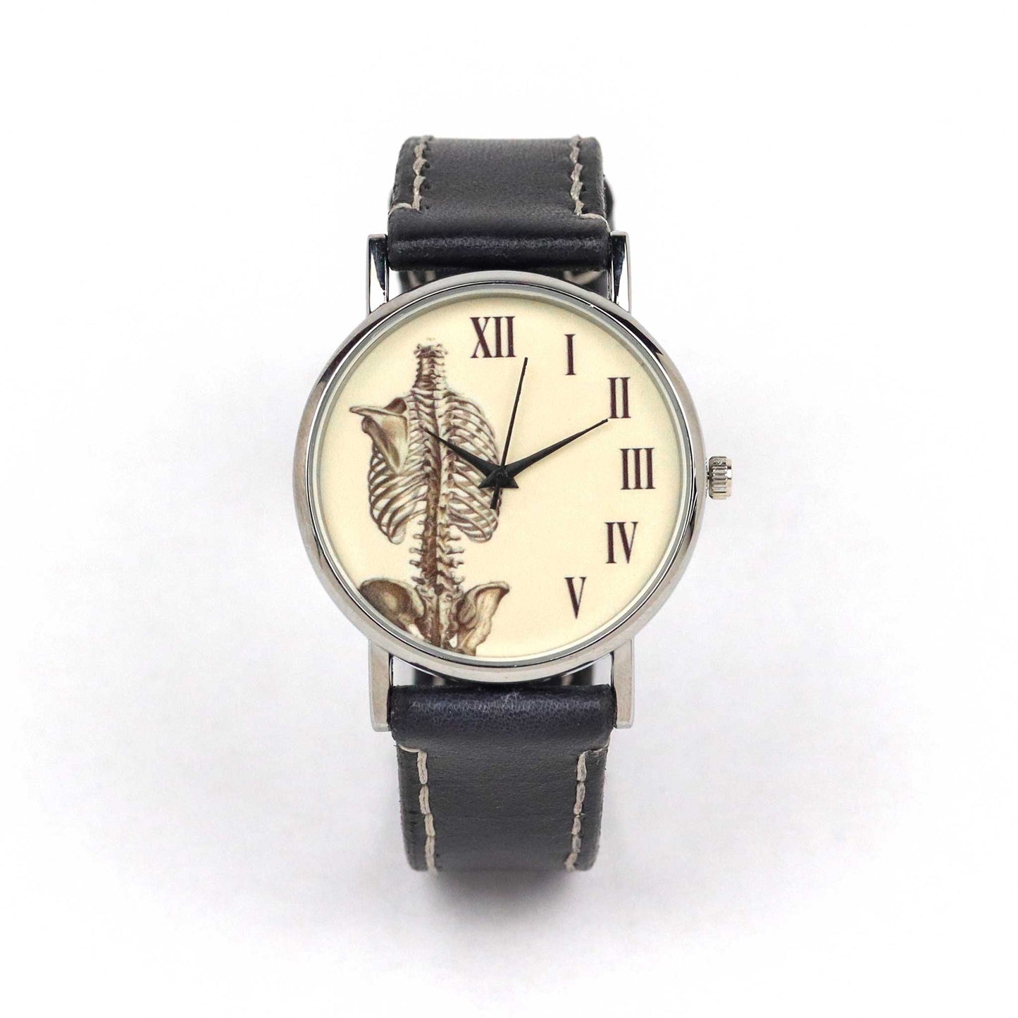 black strap wrist watch with skeletal system dial